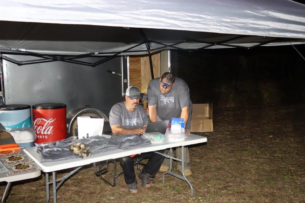 Event volunteers working at the registration table